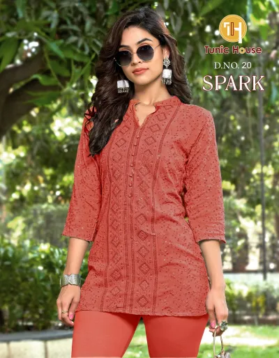 Tunic House Spark Short Top D.NO. 20: Rust-colored short kurti with tonal thread embroidery and subtle sequin embellishments.