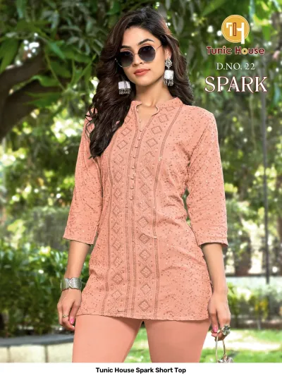 Tunic House Spark Short Top D.NO. 22: Peach-colored short kurti featuring intricate tonal thread embroidery and delicate sequin detailing.