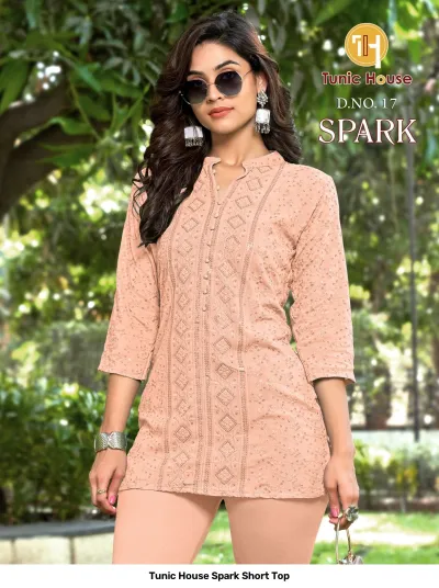 Tunic House Spark Short Top D.NO. 17: Light peach short kurti adorned with detailed tonal thread embroidery and sequin embellishments.