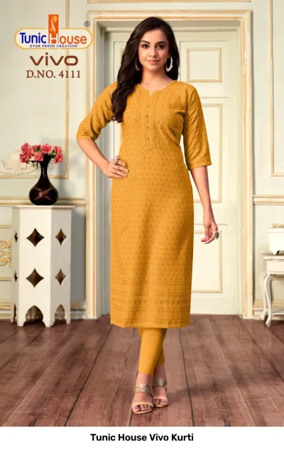 Tunic House Vivo Kurti D.NO. 4111 mustard yellow straight cut kurti with all-over chikankari embroidery and sequin embellishments.