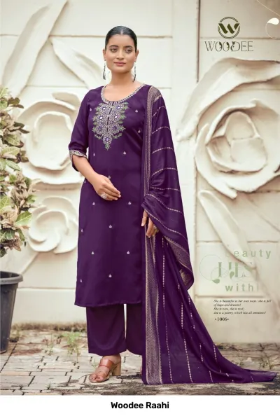 Woodee Raahi: Purple salwar suit with mirror work neckline detail, straight-cut trousers, and a coordinating dupatta with zari work.