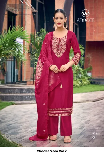 Woodee Veda Vol 2 magenta pink salwar suit featuring matching straight pants, solid fabric, and gold thread embroidery on neckline and hem.