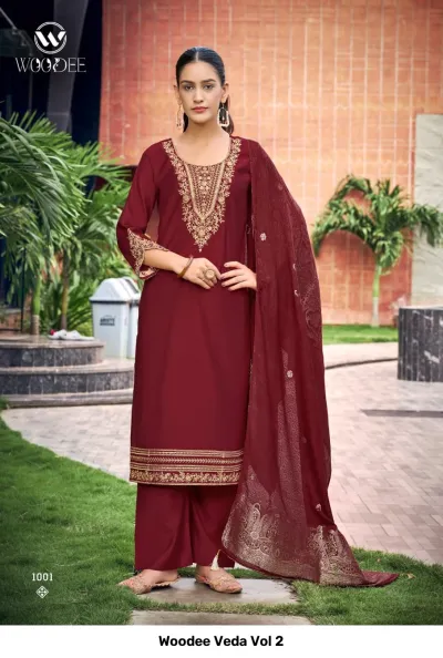 Woodee Veda Vol 2 maroon salwar suit with straight cut pants, solid fabric, and gold thread embroidery on neckline and hem.