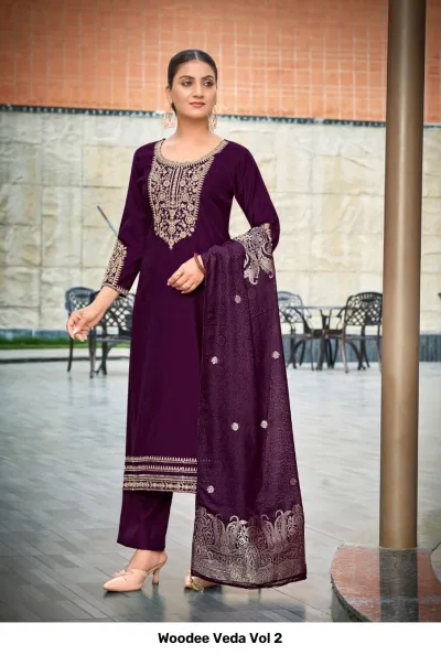 Woodee Veda Vol 2 deep purple salwar suit with matching pants and dupatta, featuring gold thread embroidery on neckline and sleeves.