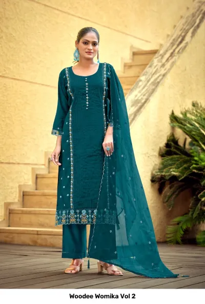 Woodee Womika Vol 2: Teal salwar suit with straight-cut kurti, palazzo pants, and embroidered dupatta featuring detailed thread work and embellishments.