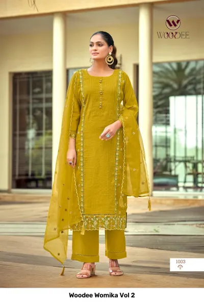 Woodee Womika Vol 2: Mustard yellow salwar suit with straight-cut kurti, palazzo pants, and sheer dupatta, featuring vertical thread embroidery details.