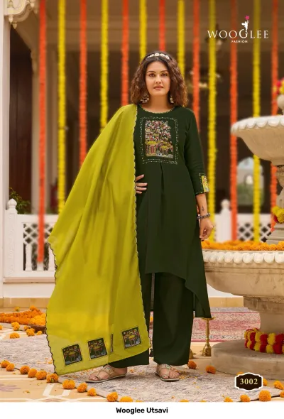 Wooglee Utsavi 3002: Olive green solid salwar suit with high-low kurti, embroidered chest patch, and lime green dupatta.