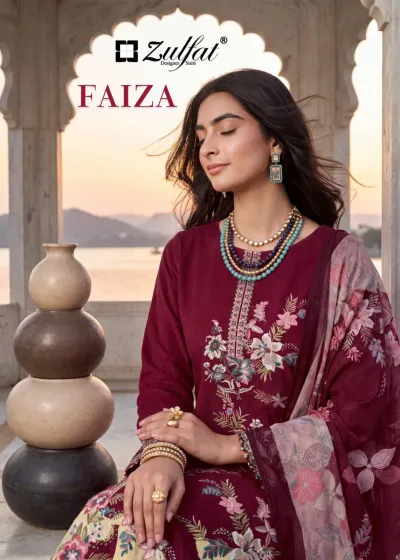 Zulfat Faiza: A woman wearing a maroon straight cut salwar suit with floral prints, thread work embroidery, and a matching printed dupatta.