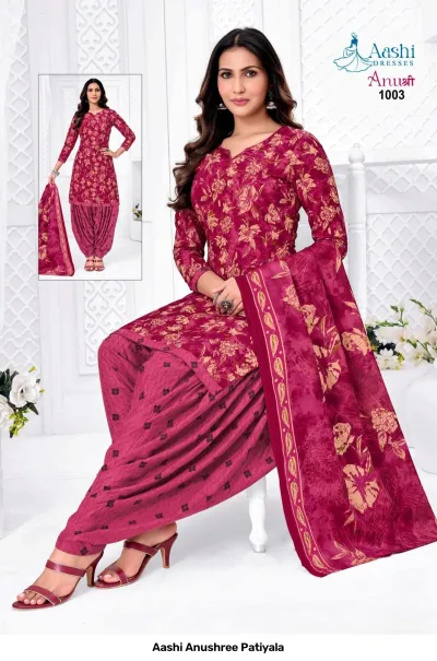 Aashi Anushree Patiyala light green and dark green printed salwar suit with circular patterns.
