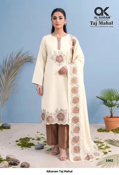 Alkaram Taj Mahal 1002: Cream salwar suit with brown rose embroidery, solid brown pants, and a matching floral-embroidered dupatta.