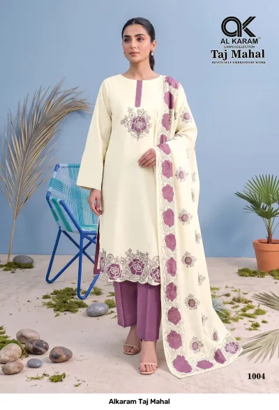 Alkaram Taj Mahal 1004: Cream salwar suit with purple rose embroidery, solid purple pants, and a matching floral-embroidered dupatta.