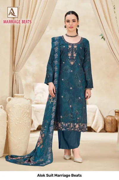 Alok Suit Marriage Beats: Teal blue salwar suit featuring a floral print, thread work embroidery on the neckline, and a coordinated printed dupatta.