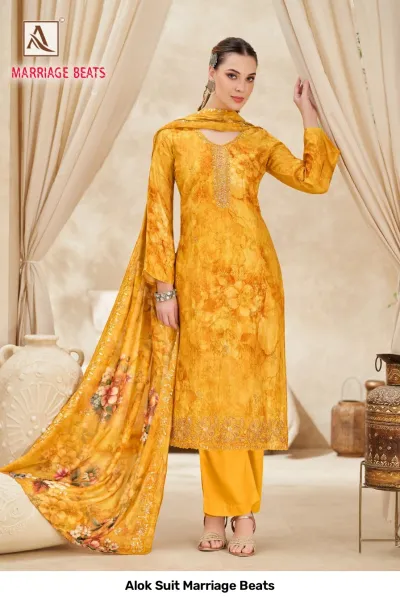 Alok Suit Marriage Beats: Yellow floral printed salwar suit featuring neckline embroidery and a matching yellow printed dupatta.