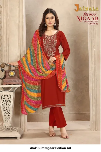 Alok Suit Nigaar Edition 40: Red salwar suit with straight kurti, trousers, and a multi-colored striped and dotted printed dupatta with neck thread work.