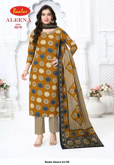Baalar Aleena Vol 30 mustard yellow salwar suit with circular geometric print and striped trousers.