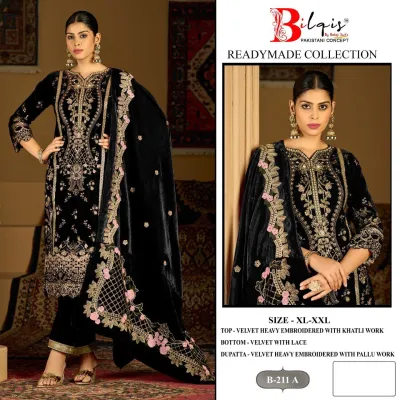 Bilqis B 211 A: Black velvet Pakistani suit with heavy embroidery, khatli work, lace-trimmed trousers, and an embroidered velvet dupatta.