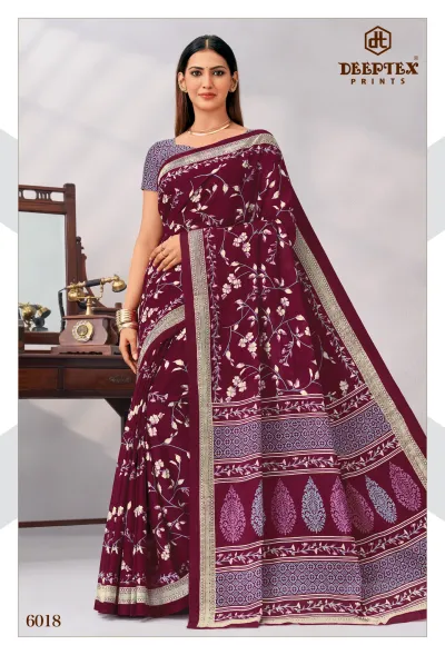Deeptex Mother India Vol 60, maroon floral printed saree with contrasting border and matching blouse.