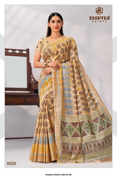 Deeptex Mother India Vol 60, mustard yellow floral printed saree with a geometric border.