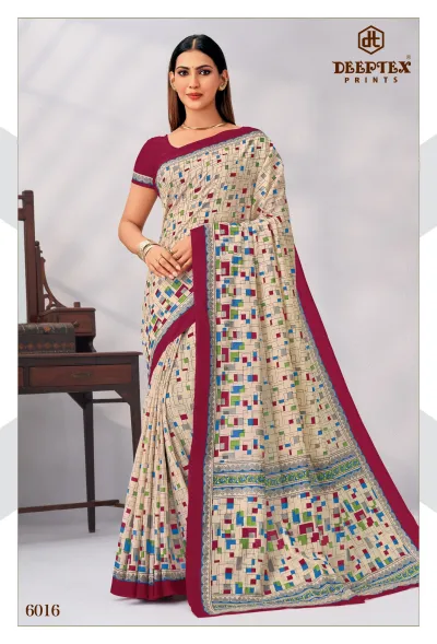 Deeptex Mother India Vol 60, beige geometric patterned saree with a maroon border.