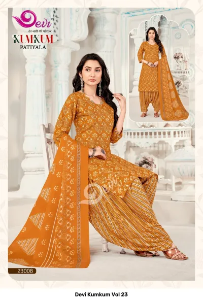 Devi Kumkum Vol 23: Mustard yellow printed kurti with matching printed patiyala salwar and dupatta.