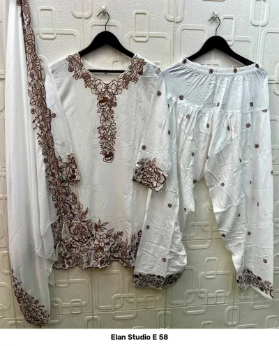 Elan Studio E 58: White rayon salwar suit set with brown floral thread work embroidery embellishments on the kurti, salwar, and matching dupatta.