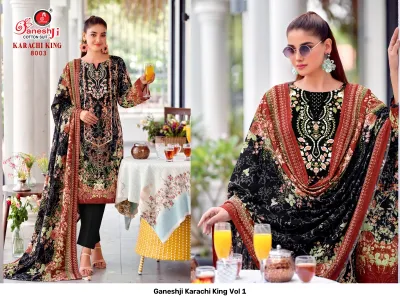 Ganeshji Karachi King Vol 1: Black cotton salwar suit with vibrant multicolored floral prints and decorative thread work on the chest.
