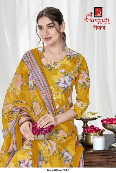 Ganpati Riwaz Vol 2 close-up of a mustard yellow salwar suit with floral print and matching dupatta.