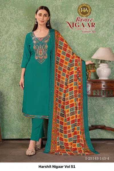Harshit Nigaar Vol 51: Teal green salwar suit with paisley thread work embroidery and a colorful geometric printed dupatta.