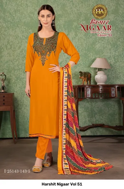 Harshit Nigaar Vol 51: Mustard yellow salwar suit featuring ornate paisley thread work embroidery and a colorful diagonal stripe printed dupatta.