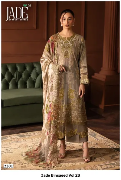 Jade Binsaeed Vol 23: Greyish-brown salwar suit with floral prints, detailed gold and green thread work embroidery, and a matching printed dupatta.