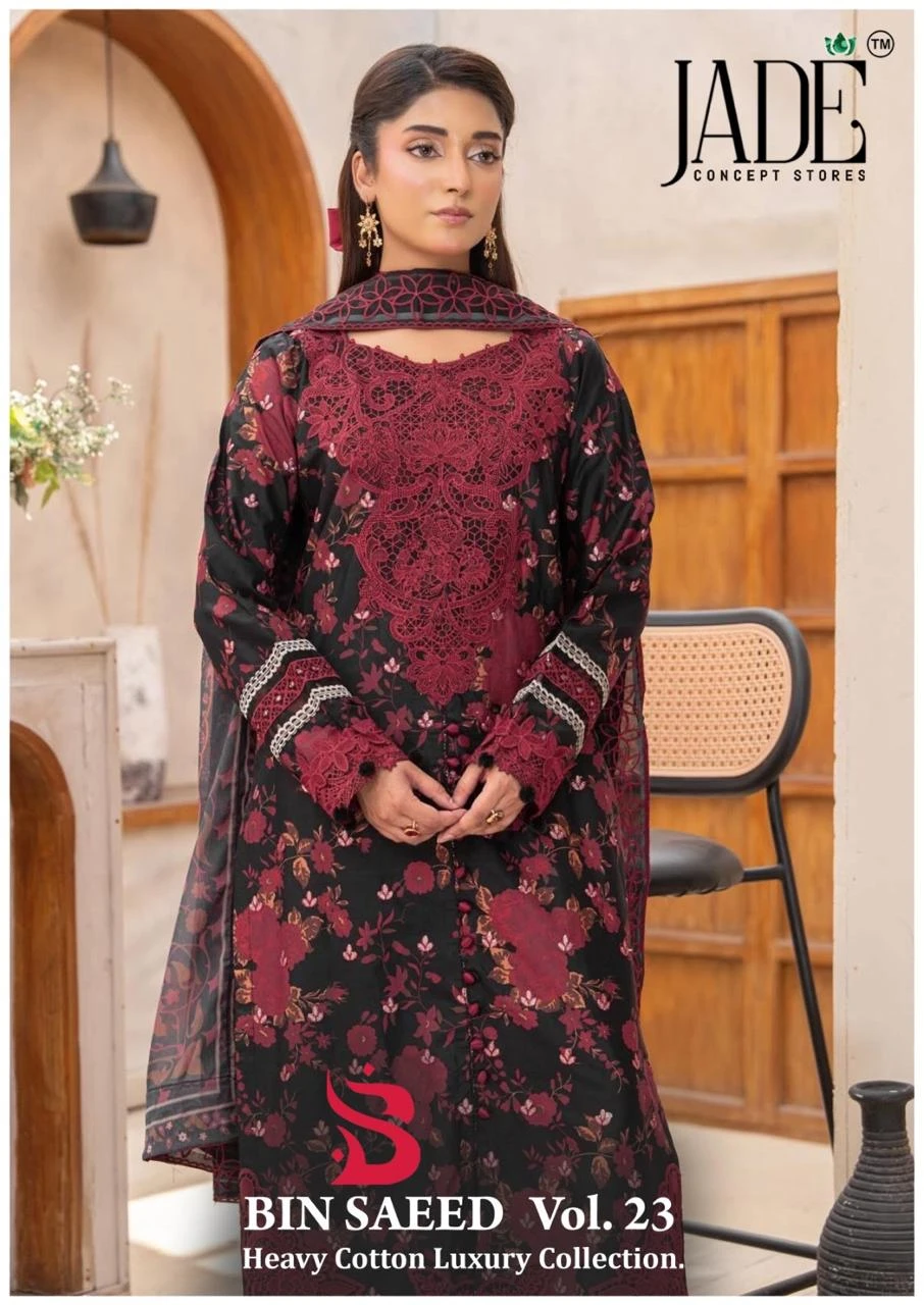 Jade Binsaeed Vol 23 - Readymade Dress: Model wearing a black cotton salwar suit with red floral print and intricate red thread work embroidery.