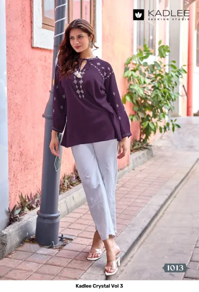 Kadlee Crystal Vol 3, dark purple kurti with white thread work embroidery and tassel neck detailing.