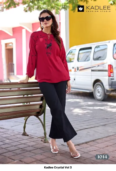 Kadlee Crystal Vol 3, deep red kurti with black thread work embroidery and tassel neck detailing.