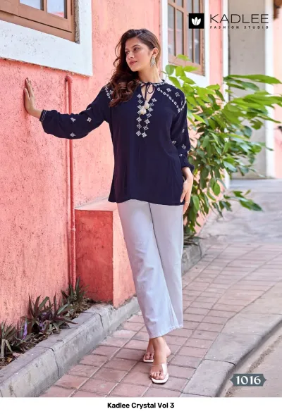Kadlee Crystal Vol 3, dark blue kurti with white thread work embroidery and tassel neck detailing.