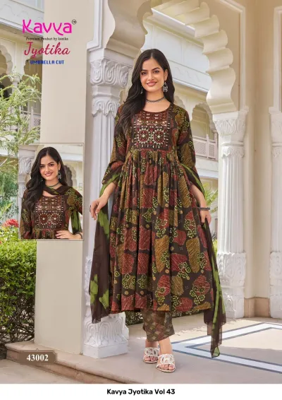 Kavya Jyotika Vol 43: Brown umbrella cut salwar suit with geometric/tribal print, thread work, and matching pants with a shaded dupatta.