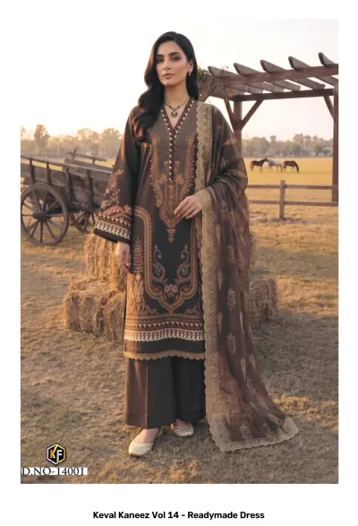 Keval Kaneez Vol 14 - Readymade Dress. Model in a dark brown cotton salwar suit with intricate printed patterns and a matching printed dupatta.