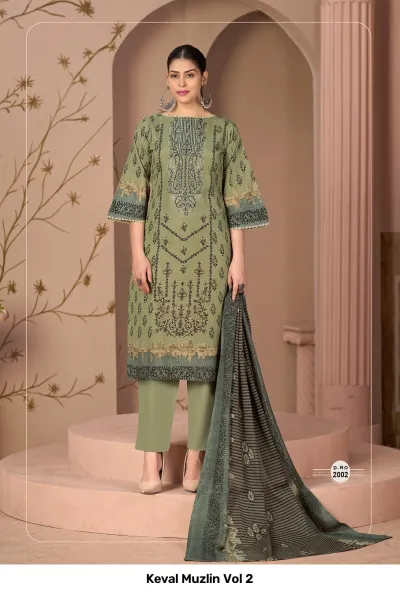Keval Muzlin Vol 2: Sage green salwar suit with dark patterned detailing, thread work embroidery on the bodice, plain pants, and a dark patterned dupatta.