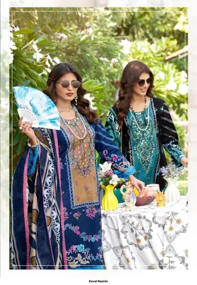 Keval Naznin catalog image showing a dark blue and tan printed cotton salwar suit with floral embroidery and dupatta.