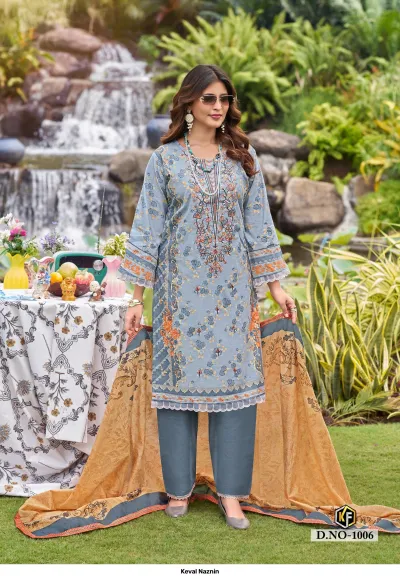 Keval Naznin D.NO-1006, greyish-blue floral printed cotton salwar suit featuring intricate embroidery and an ochre yellow dupatta.