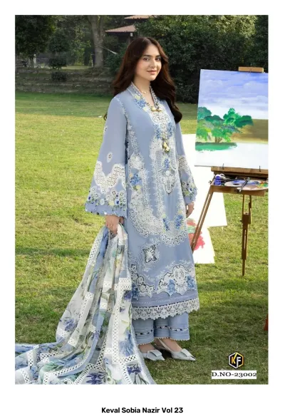 Keval Sobia Nazir Vol 23: A woman in a light blue embroidered salwar suit with floral details and a printed dupatta.