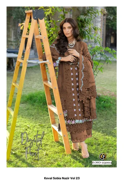 Keval Sobia Nazir Vol 23: A woman wearing a brown embroidered salwar suit with floral details and a coordinating dupatta.