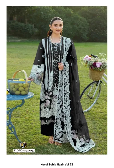 Keval Sobia Nazir Vol 23: A woman wearing a black and white embroidered salwar suit with floral motifs and a coordinating dupatta.