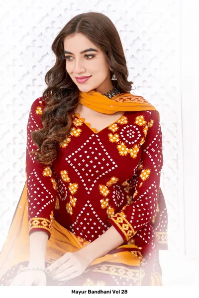Mayur Bandhani Vol 28 maroon and orange printed salwar suit fabric close-up.