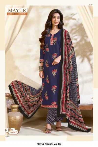 Mayur Khushi Vol 85 navy blue salwar suit with red floral motifs, a decorative neckline, printed pants, and a contrasting patterned dupatta.