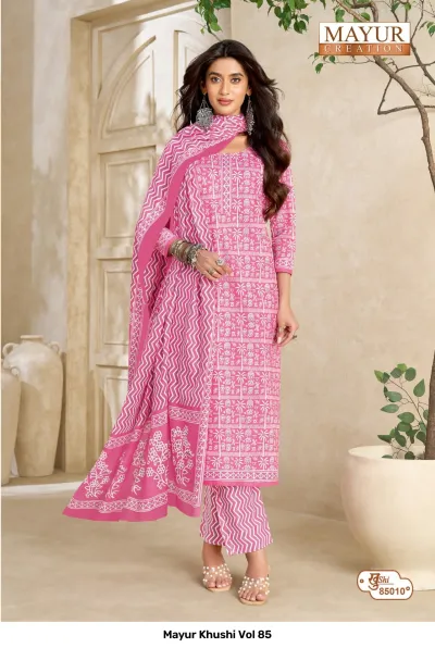 Mayur Khushi Vol 85 pink salwar suit with all-over geometric and tree prints, chevron pants, and a matching patterned dupatta.