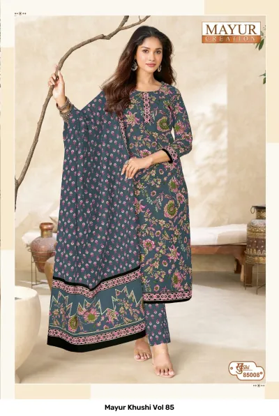 Mayur Khushi Vol 85 greyish-blue salwar suit with all-over pink and green floral prints, printed pants, and a matching dupatta.