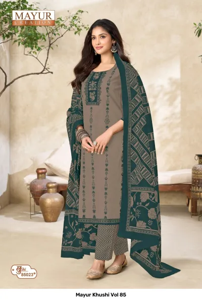 Mayur Khushi Vol 85 taupe salwar suit with an embroidered neckline, floral print pants, and a dark green border-print dupatta.