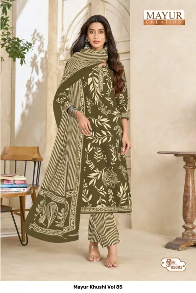 Mayur Khushi Vol 85 olive green salwar suit with large off-white leaf prints, striped pants, and a matching striped dupatta.