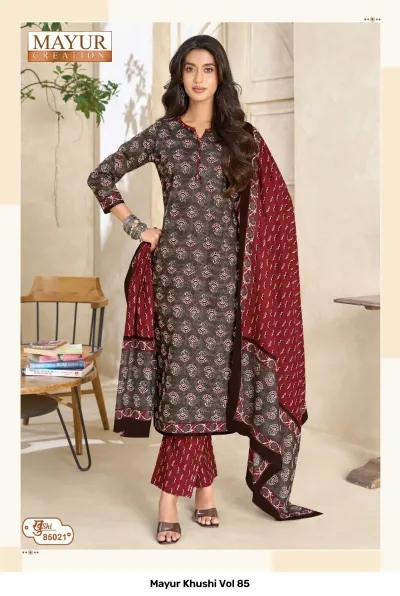 Mayur Khushi Vol 85 greyish-brown salwar suit with a small floral print, a patterned dupatta, and matching printed pants.
