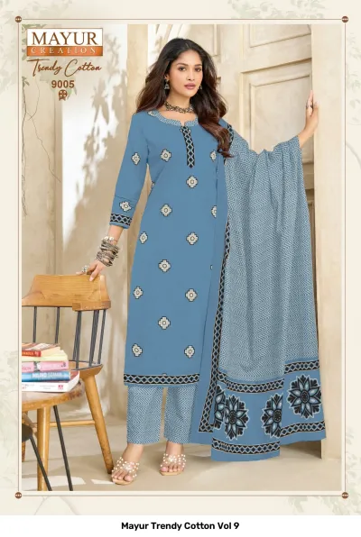 Mayur Trendy Cotton Vol 9 light blue salwar suit with white geometric motifs, chevron pants, and floral print dupatta.